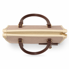 A structured top-handle handbag in beige canvas with dark brown leather handles and trim, accented by gold-tone hardware and a cream-colored zipper.