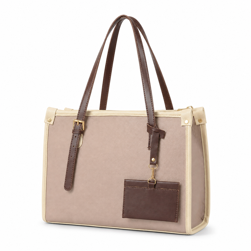 A structured tote bag in beige canvas with dark brown leather handles, trim, and a front card holder, shown on a white background.