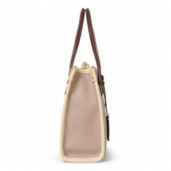 A structured tote bag shown from the side, featuring a light beige canvas body, cream leather trim, and dark brown shoulder straps, photographed against a solid white background.